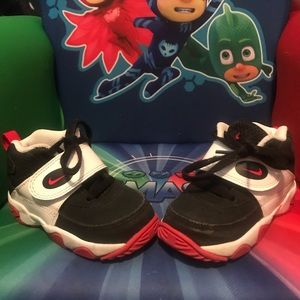 Nike black/white/red high top sneakers